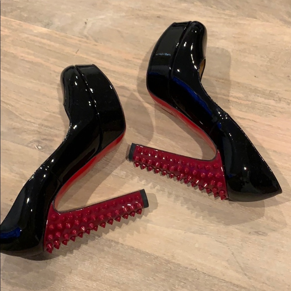 Christian louboutin shoes with red spiked heels